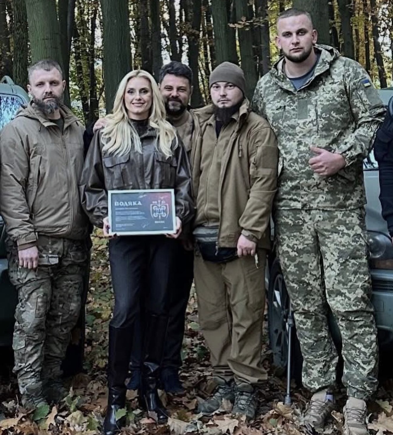 Iryna with Ukrainian soldiers