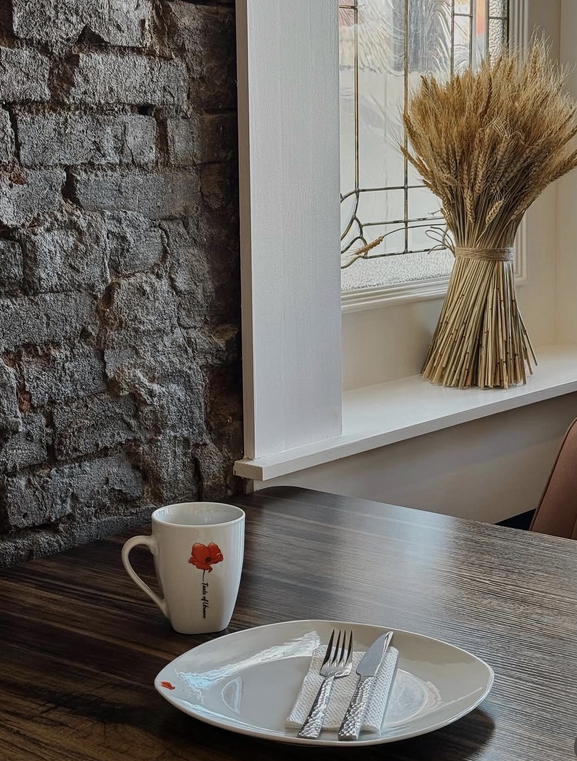 Table setting with Ukrainian poppy cup